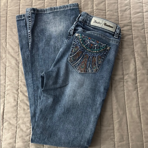 Denim Couture Blue Boot Cut Jeans with Intricate Embroidery - Picture 1 of 6